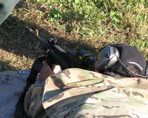 AR-15 carbine and range gear staged for the carbine class