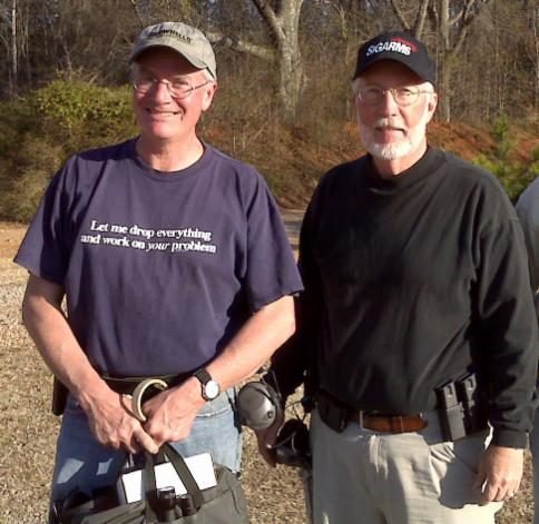 Bruce Gray of Gray Guns (left) with Chris Raper (right) at an advanced pistol class in Oxford, NC