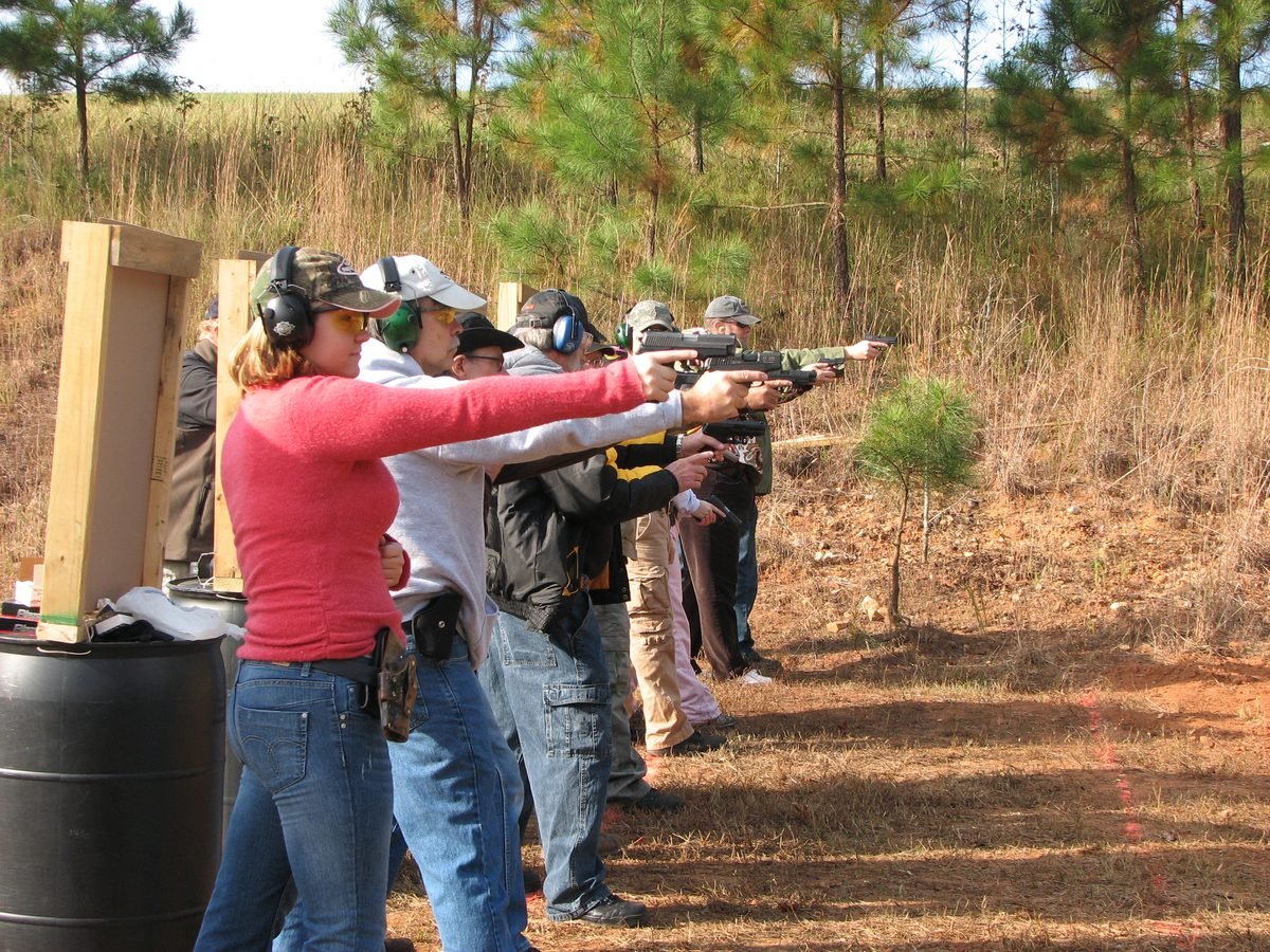 Student in the Defensive Shooting Class moving off the line of attack while drawing