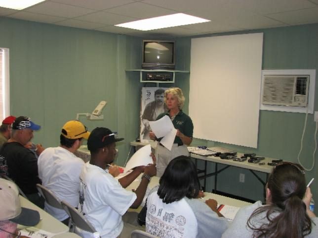 Dianne Raper, assistant instructor, prepares the class for the safety test