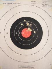 The same student's ten-shot target at seven yards after three hours of instruction